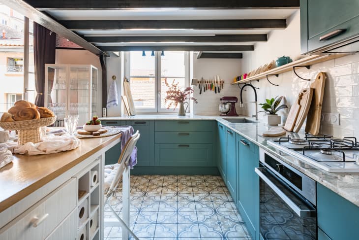 Striking Turquoise Cabinets Transform a Cramped, Dark Kitchen ...